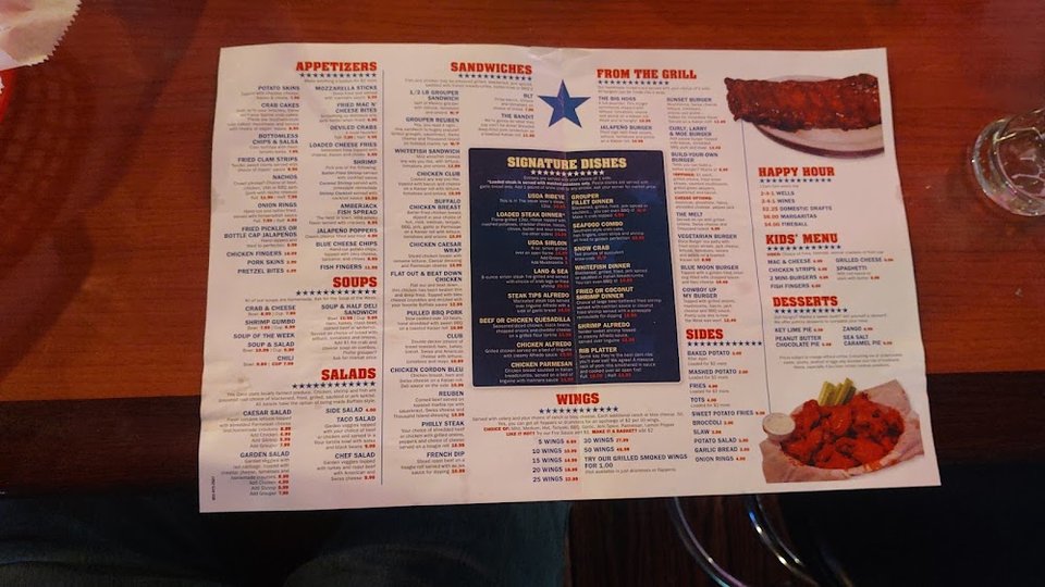 Menu page featuring grilled items and soups.
