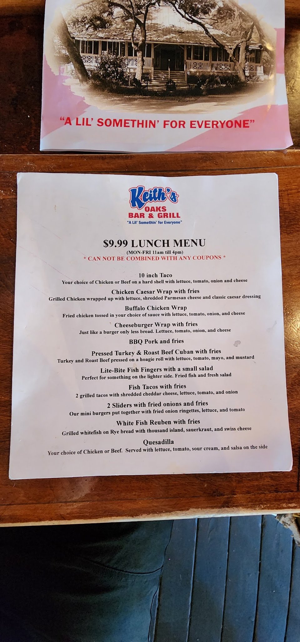 Bar and grill menu with burgers and seafood.
